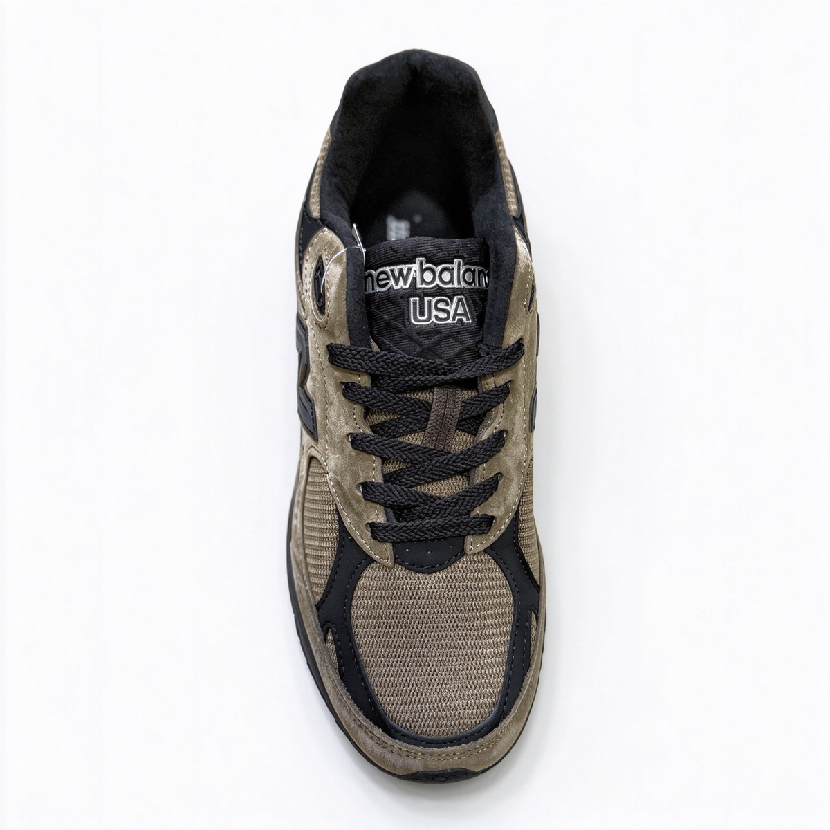 JJJJound x New Balance 990v3 classic collaboration model, Made in USA style. Premium brown suede matched with breathable mesh fabric, iconic dark black overlay, low-key vintage aesthetic, highly versatile for streetwear outfits.