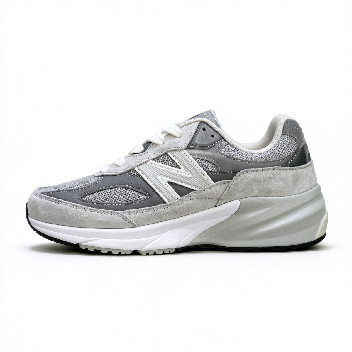 The New Balance 990v6 continues the legendary 990 series heritage, crafted with premium suede and breathable mesh upper. Classic castlerock grey colorway, timeless retro silhouette, perfect for daily outfit matching.