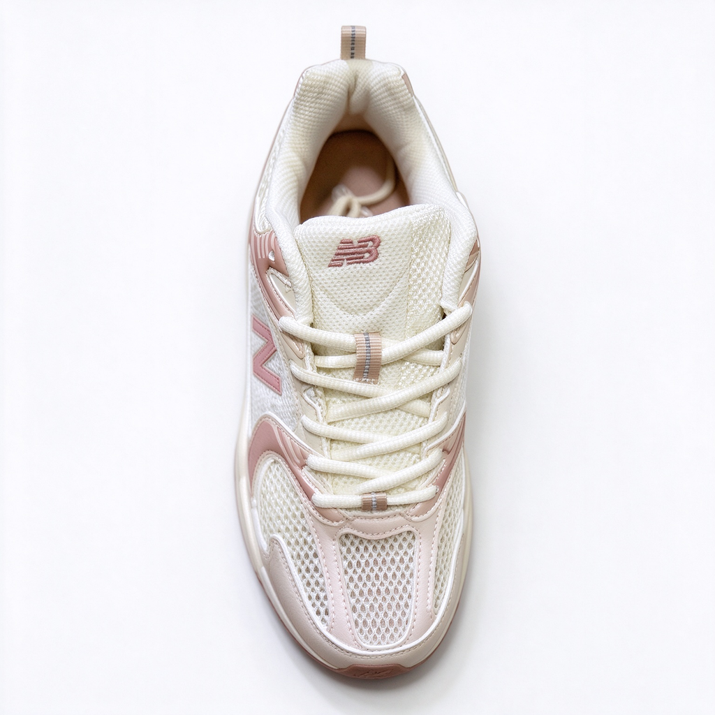New Balance Classic retro running sneakers 530 off white light pink colorway, unisex dad sneakers, especially popular for ladies.