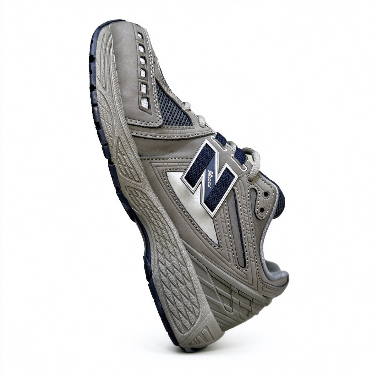New Balance Classic Y2K retro running sneakers 1906R brown grey navy colorway, unisex dad shoes for men and women.