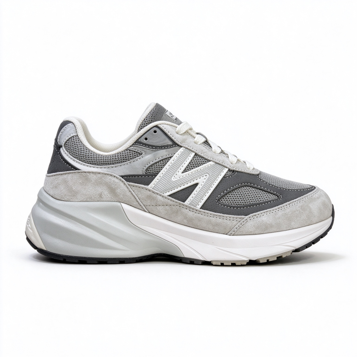 The New Balance 990v6 continues the legendary 990 series heritage, crafted with premium suede and breathable mesh upper. Classic castlerock grey colorway, timeless retro silhouette, perfect for daily outfit matching.