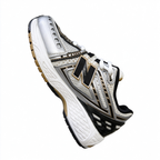New Balance Classic Y2K retro running sneakers 1906R silver white gold metallic colorway, unisex dad shoes for men and women.