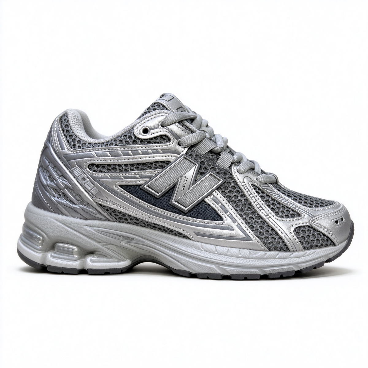New Balance Classic Y2K retro running sneakers 1906R silver grey metallic colorway, unisex dad shoes for men and women.