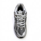 New Balance Classic Y2K retro running sneakers 1906R silver grey metallic colorway, unisex dad shoes for men and women.