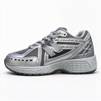 New Balance Classic Y2K retro running sneakers 1906R silver grey metallic colorway, unisex dad shoes for men and women.