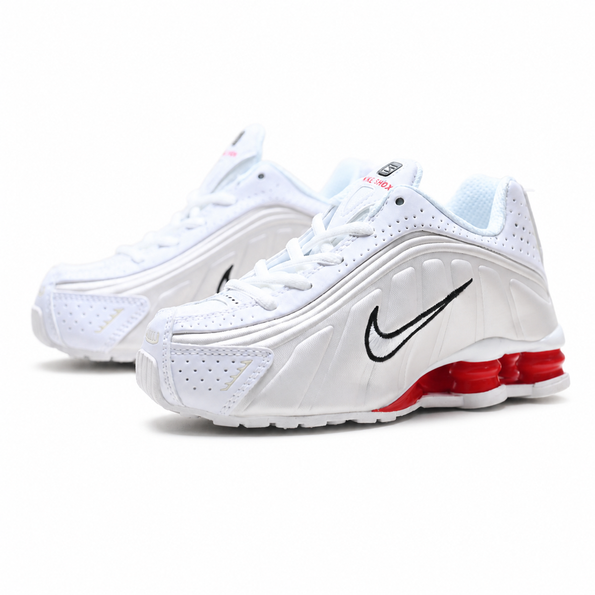 Nike Shox R4 White/Red | Retro running shoes in white red, and black + Shox cushioning + Y2K millennial style unisex chunky sneakers a hot trend for spring and summer